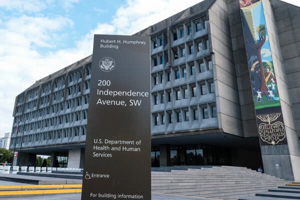 A government building representing the Department of Health and Human Services
