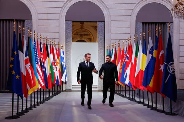 European leaders seated at a conference table discussing geopolitical matters