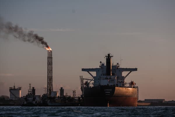 Aerial view of oil storage tanks and infrastructure, representing the assets seized by Venezuela.