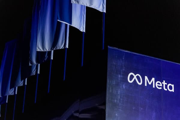 Illustration showing Meta logo and Chinese flag representing antitrust investigation