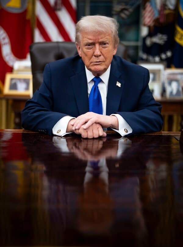 Donald Trump speaking at a podium