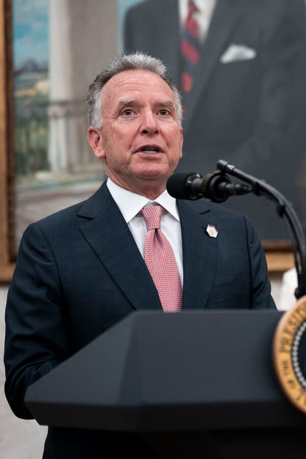 Steve Witkoff speaking at a podium during a diplomatic meeting